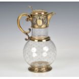 A Victorian etched glass and silver gilt claret jug W & G Sissons (William & George Sissons),