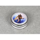 A Swiss silver and enamel circular box decorated with a horse and beauty within a pale pink