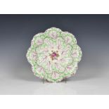 A First Period Worcester cabbage leaf dish c.1770, floral spray to centre, 10¾in. (26cm.) diameter.*