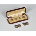 A pair of 18ct gold & Enamel Coldstream Guards cufflinks and matching cased set of four shirt studs.