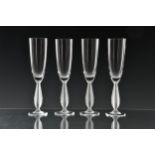 A set of twelve Art Deco style crystal champagne flutes by Daum of Nancy the plain bowls on frosted,