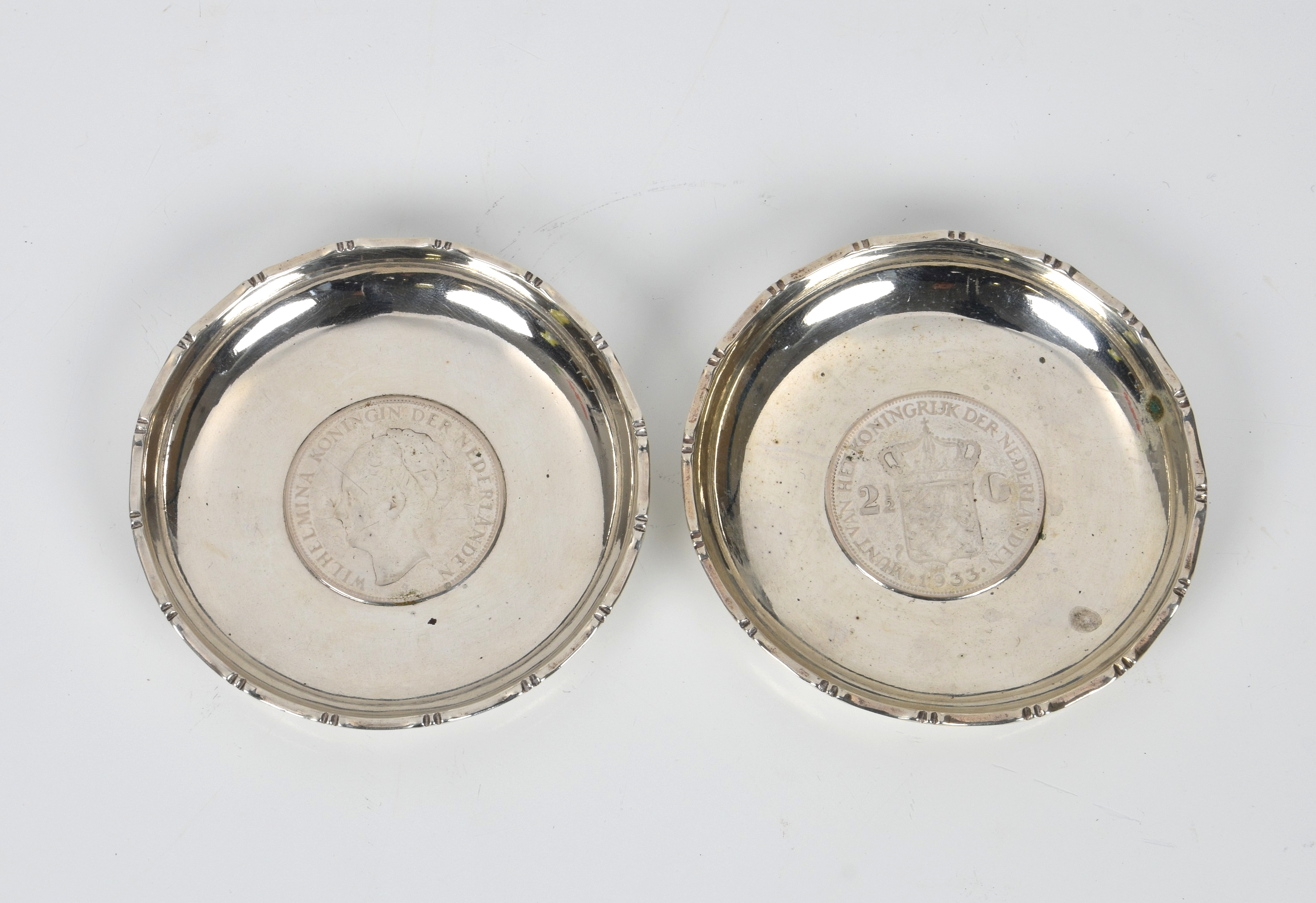 A pair of Hong Kong silver pin dishes by Wai Kee, with inset 1933 Dutch 2½ guilder coins, 3½in. (8. - Image 2 of 2