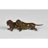 A bronze figure group of two Dachshunds French, c.1860, unmarked, 5in. (12.7cm.) long.*