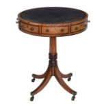 A small late-Regency inlaid mahogany drum table the revolving top with inset green gilt tooled