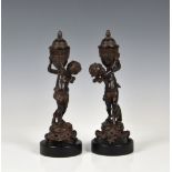 A pair of carved wooden figural cassoulets in the Louis XV style, late 20th century, painted to
