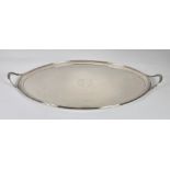 A George III twin handle silver tray William Bennett, London, 1798, of oval form, reeded handles and
