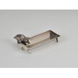 A novelty Edwardian silver pig & trough pin tray / salt Adie & Lovekin Ltd, Birmingham, 1907, pig