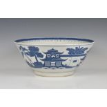 A large Chinese blue & white punch bowl late 18th / early 19th century, decorated with landscape,