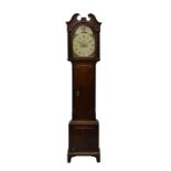 A late 18th century oak eight day longcase clock the bell strike movement fronted by a painted Roman