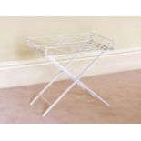 A painted metal tray top table modern, the fixed, slatted tray top with pierced scroll sides, on