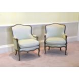 A pair of 19th century French carved and painted beechwood fauteuils the serpentine backs, seats and