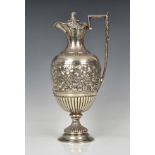 A Victorian classical style 'Cellini' lidded wine ewer Haseler Brothers, Birmingham, 1894, with