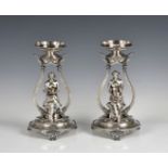 A pair of Victorian electroplated figural tazza stands in the manner of Elkington & Co, marked '