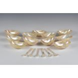 A set of eleven mother-of-pearl caviar dishes each of boat form, approx. 5½in. long, together with