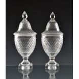 A good pair of early 19th century Voneche cut glass urn shaped jars and covers lemon squeezer