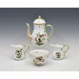 A Herend Rothschild pattern coffee pot with sugar bowl and two cream jugs, decorated with Meissen