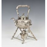 A Chinese export silver tea Kettle on stand by Zeewo with floral & butterfly decoration on matted