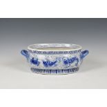 A large modern Chinese blue & white fish soup tureen of bellied twin handle oval form, decorated