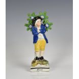 An early 19th century Staffordshire pottery pearlware figure, 'Sloth' standing on a square,