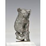 A mid-20th century chrome koala car mascot central screw bolt to base, 3½in. (9cm.) high.