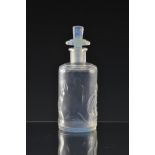 A Sabino opalescent moulded glass scent bottle the cylindrical opalescent glass body moulded with