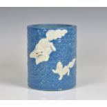 A Chinese Republic period brush pot with robin's egg glaze and relief decoration of a kylin and