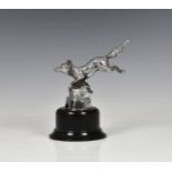 A chrome fox car mascot French, c.1920, by A. Renevey, modelled running, mounted on ebonised base, 6