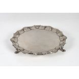 A George II silver small salver maker WI (probably William Justis), London, 1754, circular form with