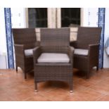 A set of three Hartman woven faux-rattan garden or conservatory armchairs with loose seat