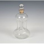 A George VI silver mounted glug-glug decanter Asprey & Co Ltd., Birm. 1949, with globe stopper,