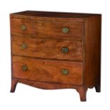 A Regency mahogany bowfront chest of drawers the cross banded top over three long graduated