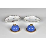 A pair of Laure Japy Limoges trinket boxes of circular domed form in blue and gold gilt, having