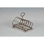 A Victorian silver six division toast rack Robert Garrard II, London, 1859, stamped with retailer '