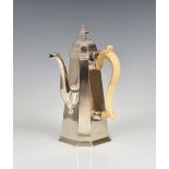 A George I Britannia standard silver octagonal coffee pot Anthony Nelme (overstruck marks),