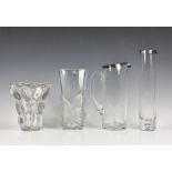 A collection of nine clear glass vases to include a Whitefriars style clear glass vase, having a
