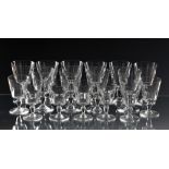 A set of ten Baccarat red wine glasses / goblets of trumpet form, shaped stem to circular base,