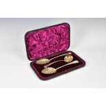 A matched cased set of silver berry spoons and sifter spoon the spoons by Chawner & Co, London,