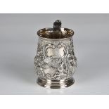 A George II silver tankard William Paradise, London, c.1730, later repoussé decorated with a