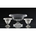 A small 18th century Irish cut glass turnover bowl of oval pedestal form, square lemon squeezer