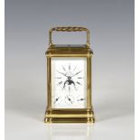 A good repeating, half hour striking gilt brass carriage clock by L'Epee the Roman enamel dial