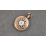 A George V 9ct gold half hunter pocket watch, the case by Dennison Watch Case Co., Birm. 1921,