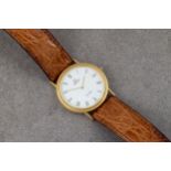 An Omega De Ville Quartz gold plated gentleman's wrist watch, the circular 25mm. white dial with