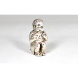 A Victorian novelty silver vesta case fashioned as a boy crouching / on potty, Sampson Mordan &