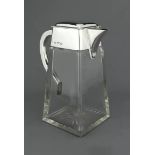 A rare Christopher Dresser style silver mounted cut glass claret jug, Heath & Middleton, London