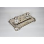 An elegant Victorian silver ink stand, S Smith & Son, London, 1868, of rectangular form with