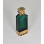 A rare Victorian silver-gilt mounted faceted emerald glass novelty combination scent bottle and