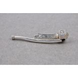 A silver bosun's whistle, third quarter 20th century, stamped '925', with chased star and foliate
