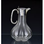 An elegant and unusual late Victorian silver mounted claret jug, William Hutton & Sons Ltd, London