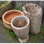 Two weathered wooden garden planters, the tallest, 23in. (58.5cm.) high, together with a large