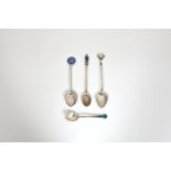 Liberty - A collection of four silver and enamel spoons, comprising one by Liberty & Co., Birm.